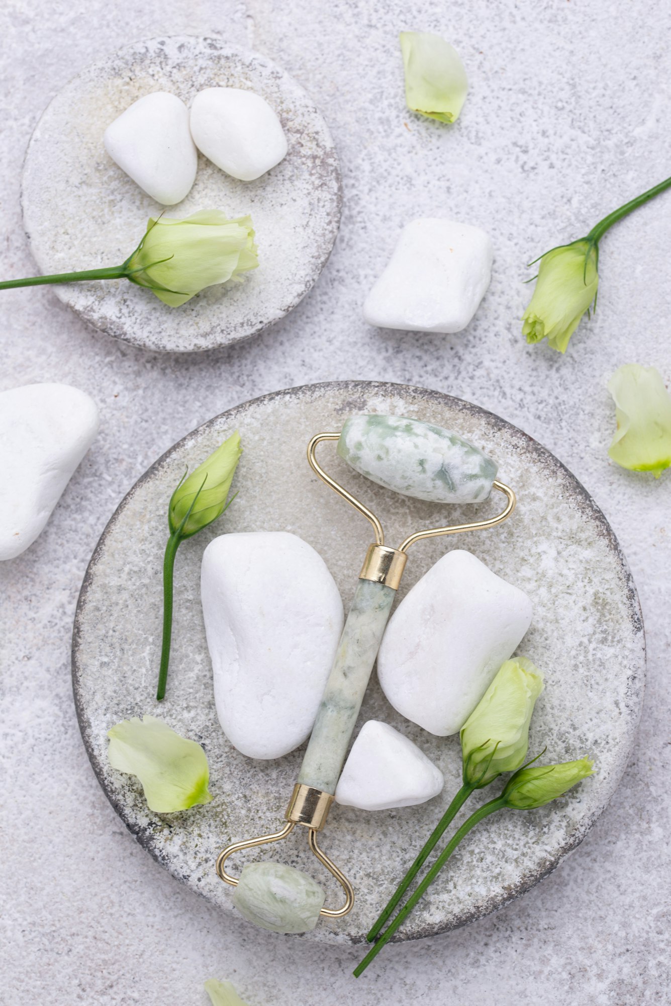 Green jade facial roller for skincare