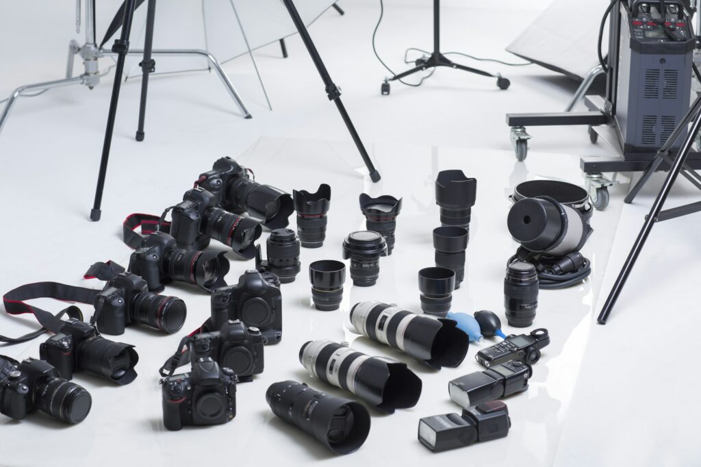 Many cameras and lenses in studio